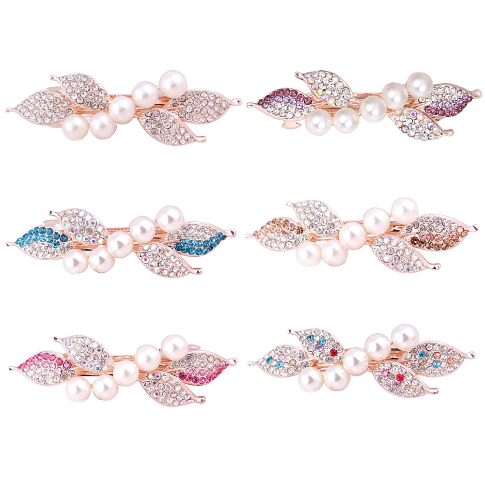 Kẹp tóc phối hình nơ đính kim cương giả và ngọc trai thanh lịch