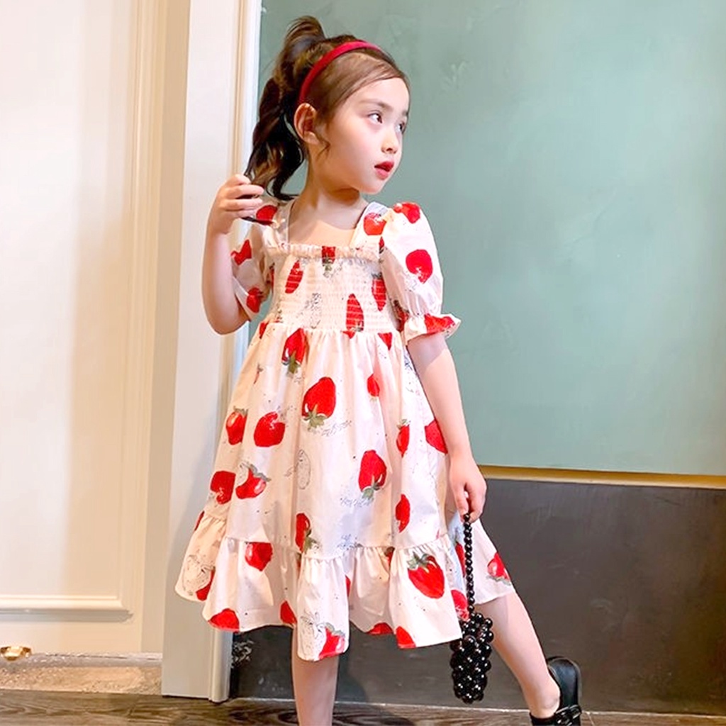 Đầm Công Chúa Tay Phồng Hở Lưng Đính Nơ Họa Tiết Dâu Tây Dễ Thương Cho Bé Gái
