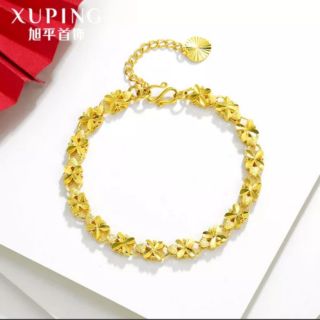 Lăc tay Xuping xi vàng non 23k khứa hoa 4 cánh