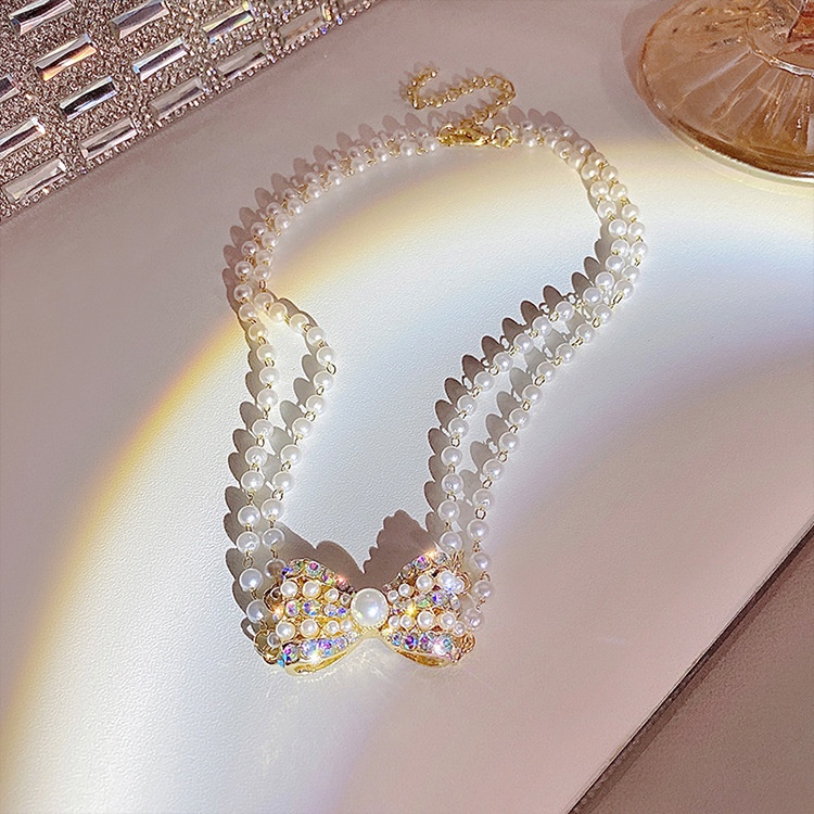 Vòng cổ Hai Lớp Thắt Nơ Đính Ngọc Trai Thời Trang Dành Cho Nữ