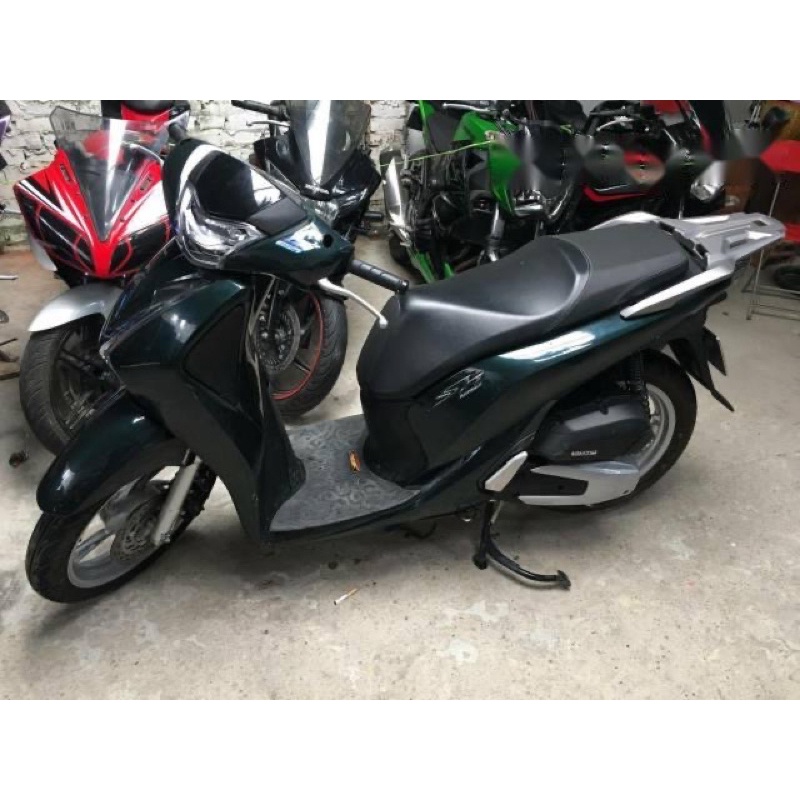 Decal 3 lớp mầu xanh lục chuyên dán đổi màu ô ô,xe máy,máy tính,dán trang trí.