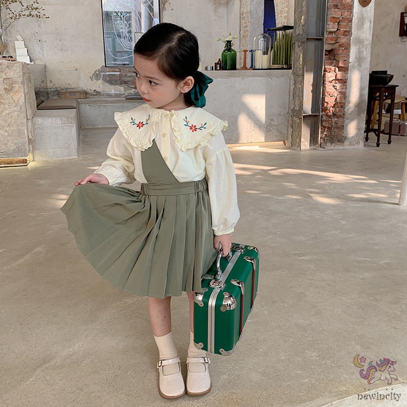 Set áo sơ mi tay dài thêu họa tiết + đầm yếm thời trang cho bé gái
