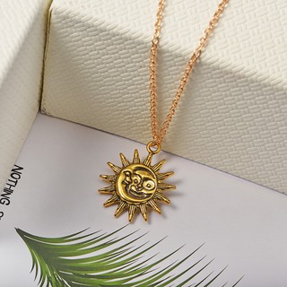 Vintage style moon and sun pendant