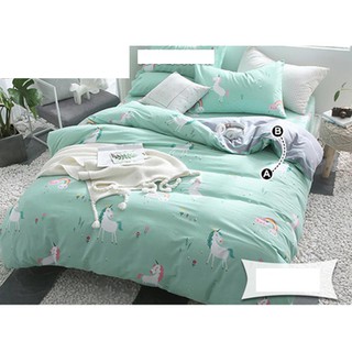 Vải may chăn ga áo gối,gối ôm khổ 2m35 hình chú ngựa một sừng nền xanh