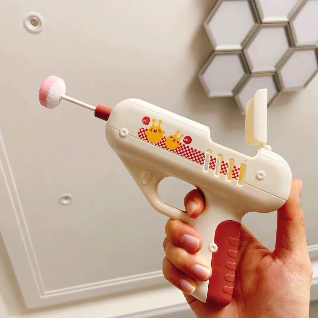 Súng bắn kẹo mút