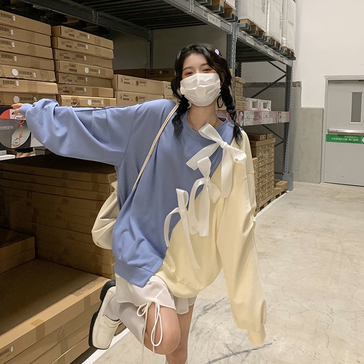 Áo sweater cổ tròn dáng rộng đính nơ màu sắc xinh xắn phong cách cá tính thời trang Hàn Quốc xuân thu cho nữ
