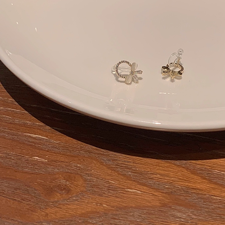 Khuyên Tai Kẹp Vành Không Xỏ Lỗ Hình Nơ Đính Đá Zircon Nhỏ Tinh Tế Cao Cấp Đơn Giản Phong Cách Hàn Quốc Dành Cho Nữ