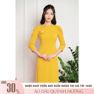 Áo dài lụa cách tân đính hoa ngực màu vàng