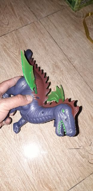 Chú khủng long chạy pin có nhạc và đèn led rất đẹp tặng kèm pin