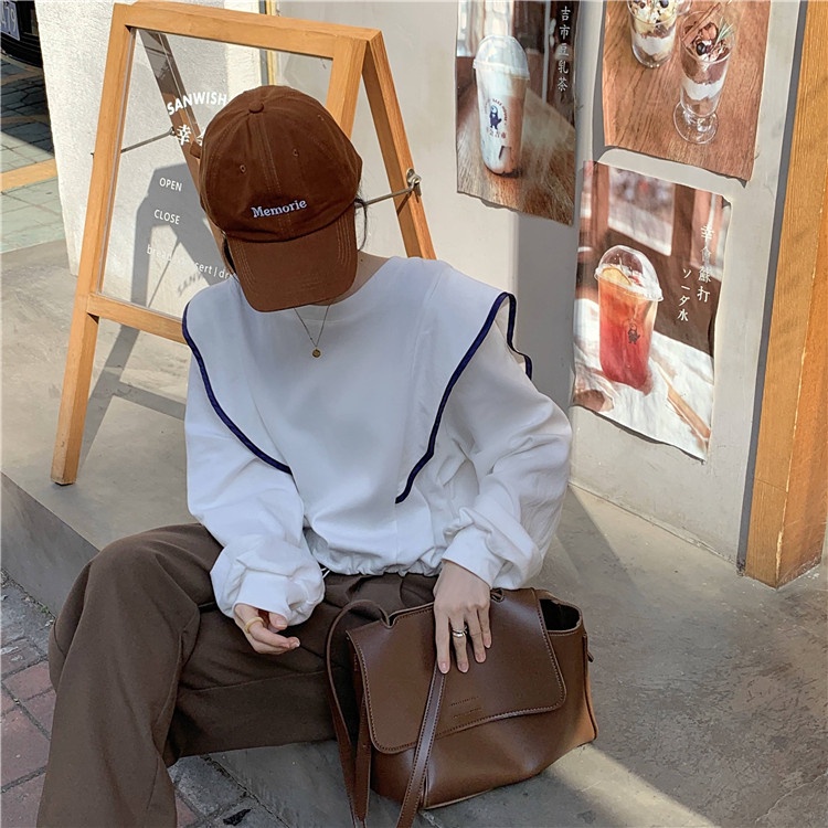 Áo thun tay dài cổ tròn thời trang sành điệu cho nữ | BigBuy360 - bigbuy360.vn