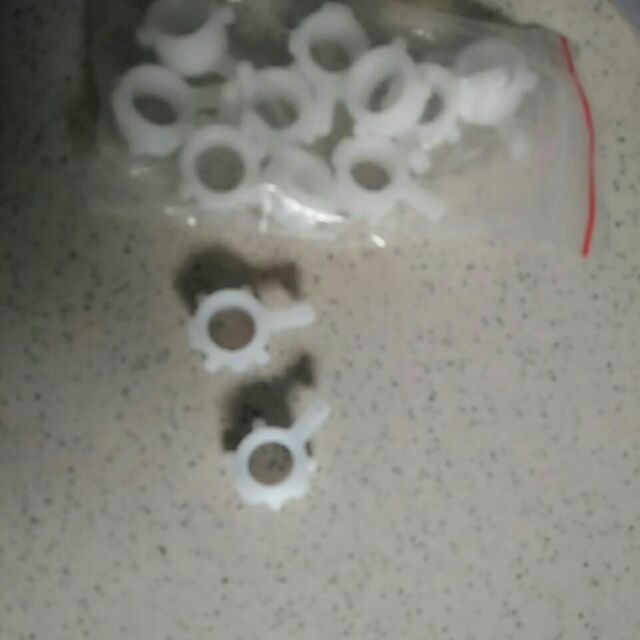 Nhông nhựa bệ đẩy giấy ra hp m401