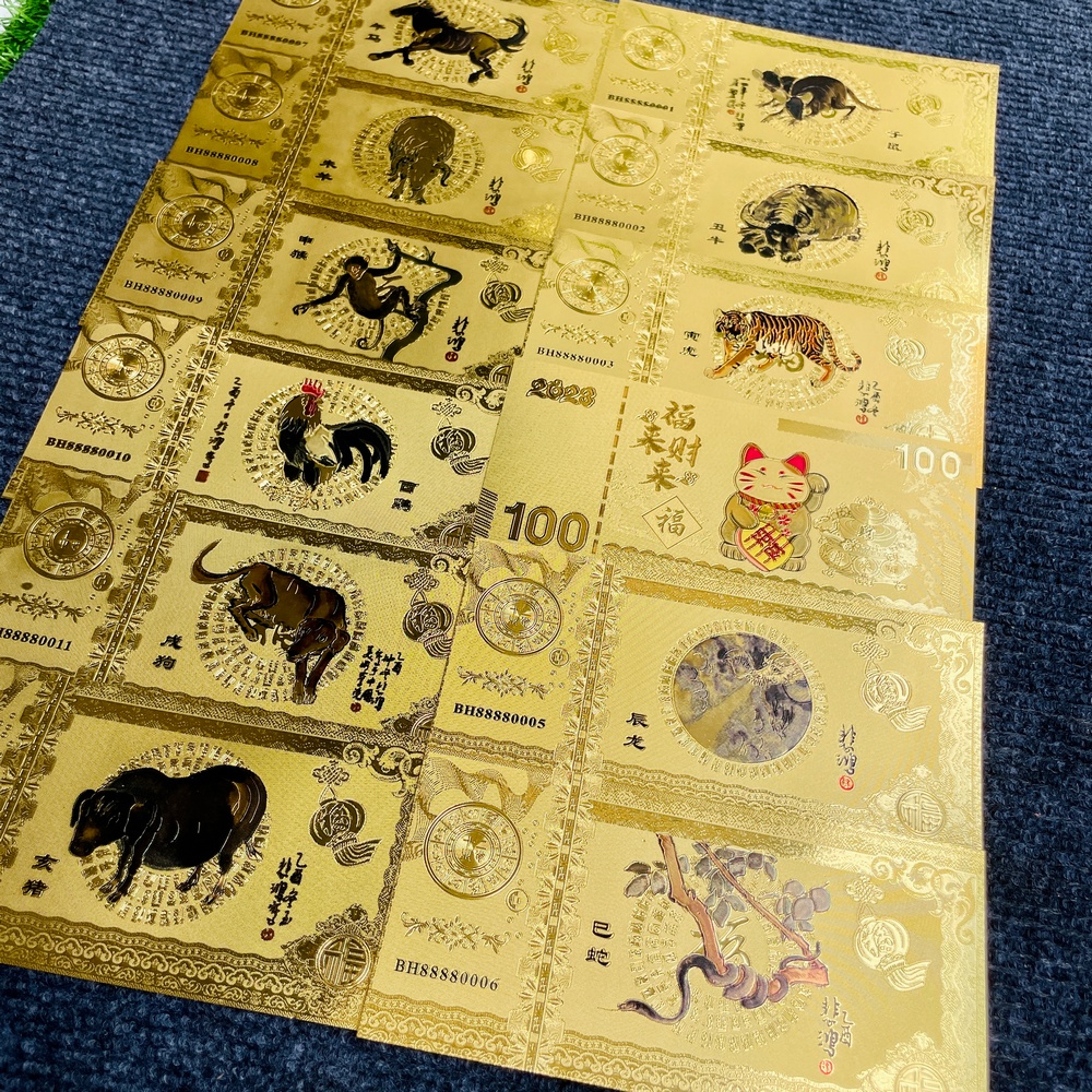 Bộ tiền lưu niệm 12 con giáp plastic vàng may mắn, phong thuỷ, lưu niệm, tặng kèm bao lì xì