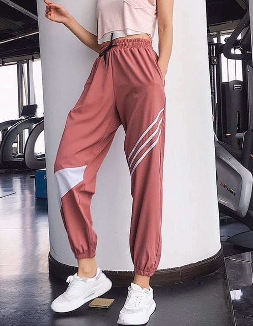 Quần jogger dù sọc đùi thể thao