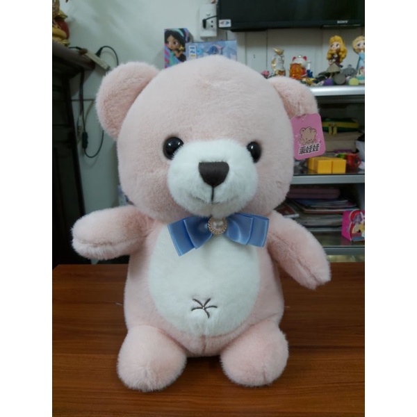 Gấu Teddy đeo nơ ngọc