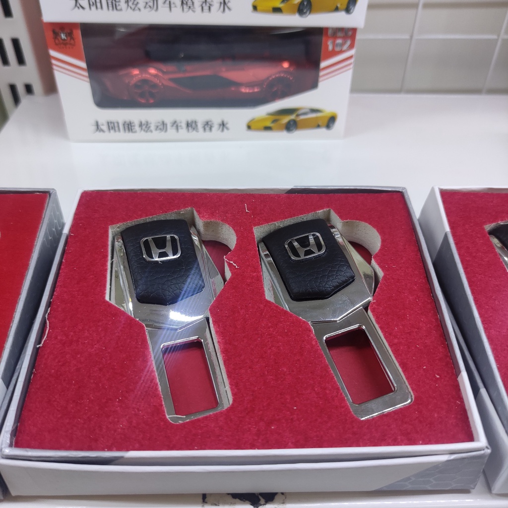 BỘ 2 CHỐT CẮM NGẮT CHUÔNG ĐAI AN TOÀN LOGO HÃNG XE