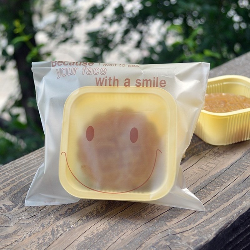 Bộ 100 Túi Nhựa Đựng Bánh Hình Mặt Cười Xinh Xắn