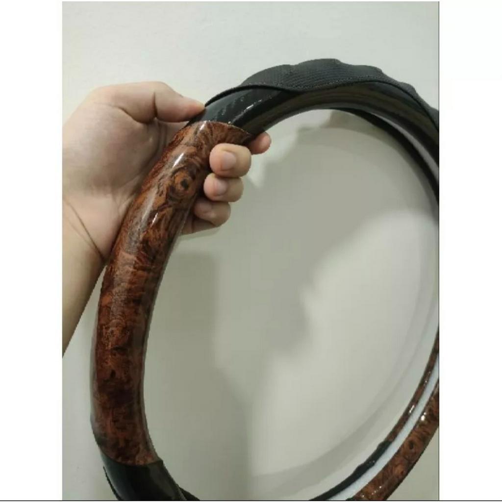 Bọc vô lăng xe tải,xe khách size 40,42,45cm sợi carbon 5D phối vân gỗ da căng bóng nhiều màu cao cấp