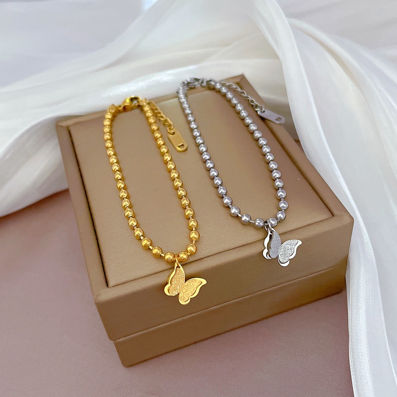 Vòng tay titan không gỉ mạ vàng 18k thiết kế bi tròn mặt hình bướm xinh xắn dành cho nữ