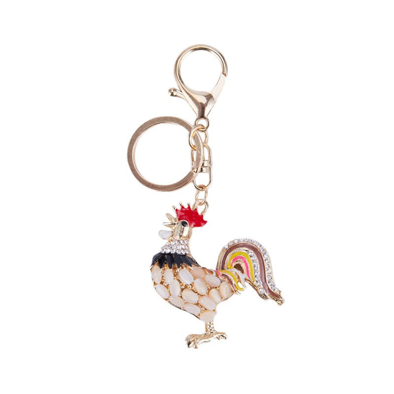Móc khóa có hình gà trống đính đá COD