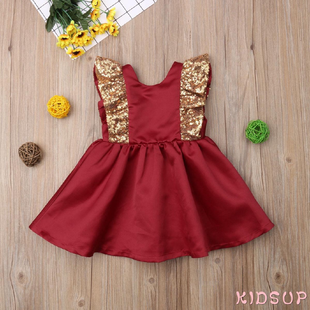 Đầm xòe không tay trang trí nơ đính kim tuyến xinh xắn cho bé gái