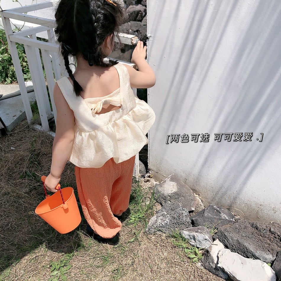 Áo Hai Dây Hở Lưng Đính Nơ Phong Cách Hàn Quốc Cho Nữ