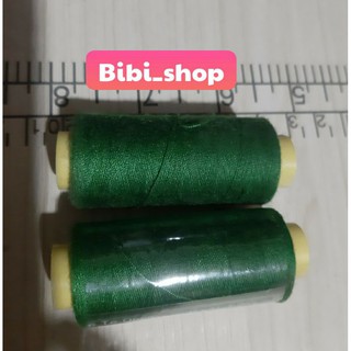 Cuộn chỉ màu xanh rêu ( màu xanh công an )
