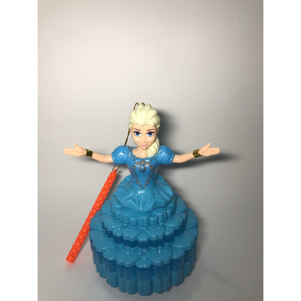 Búp bê Elsa đứng trên bông hoa, xoay vòng tròn, có nhạc, có đèn (Tặng 3 pin AA)