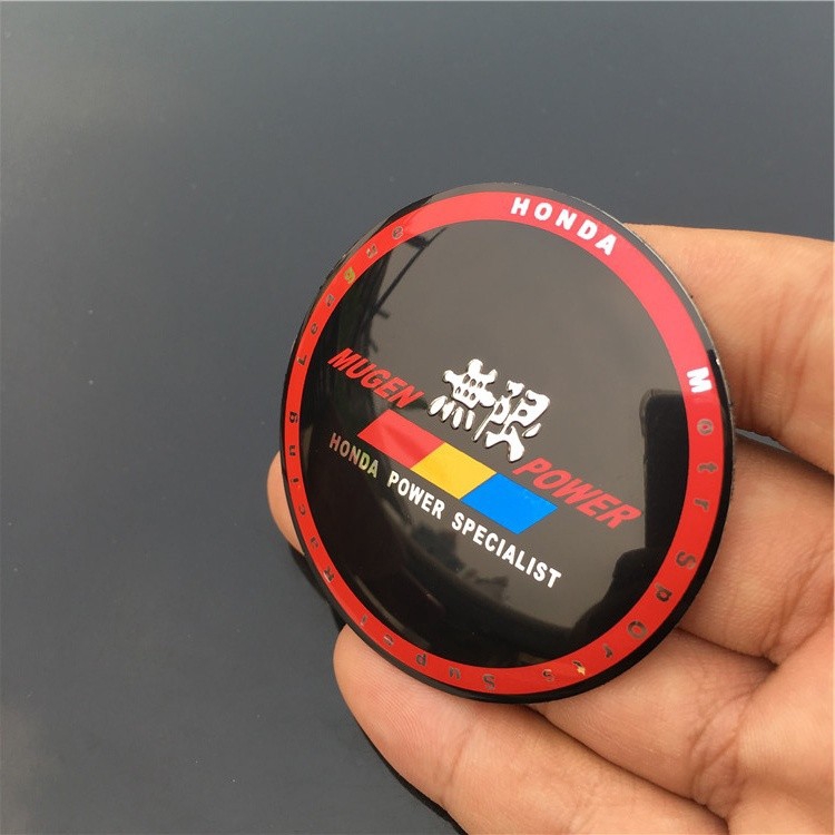 Set 4 Miếng Dán Logo Mugen 56.5mm Bằng Kim Loại Trang Trí Trục Bánh Xe Hơi Honda