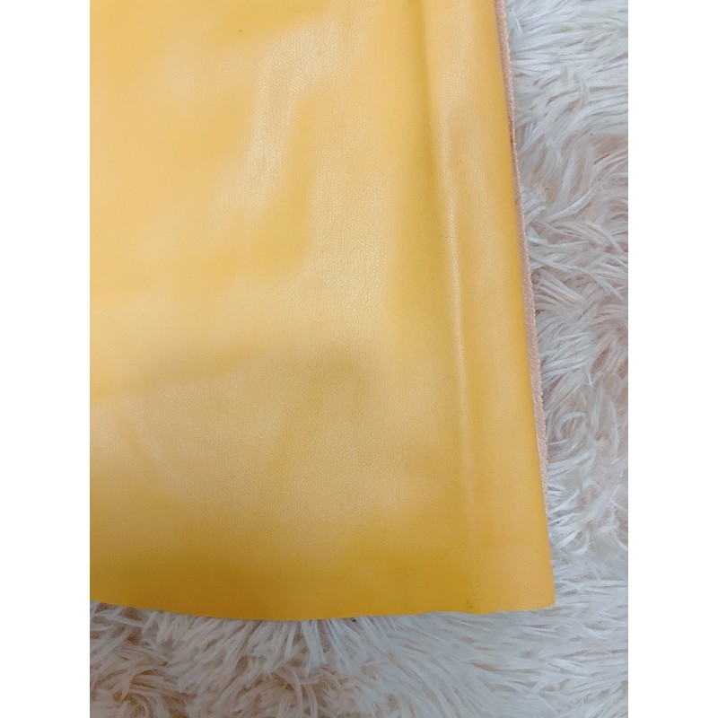 Thanh lý chân váy da màu vàng cam size xs