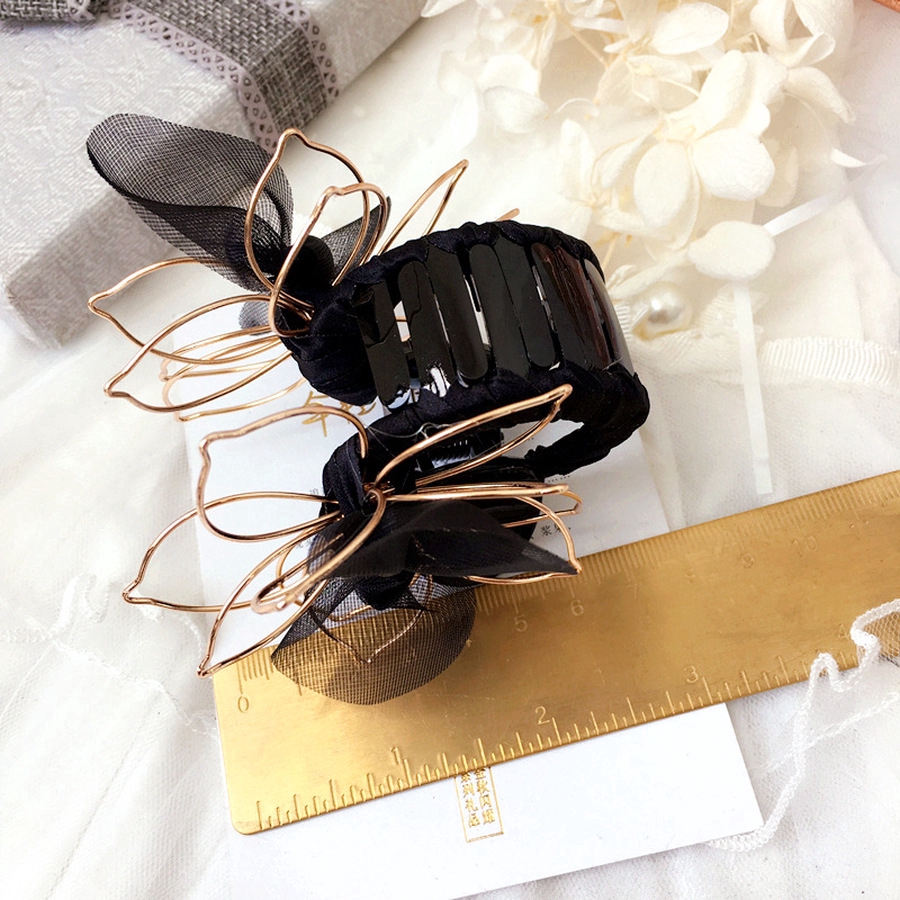 Kẹp tóc đính nơ làm đẹp cho nữ