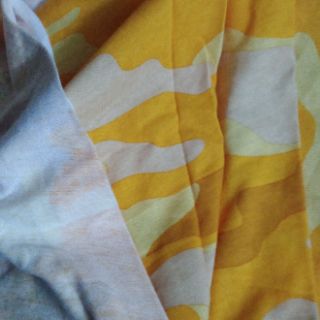 Cotton rằn ri vàng phối vàng đất chất thun 2 chiều