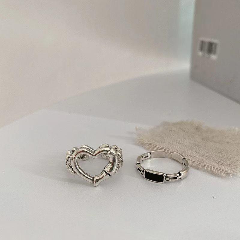 Bộ 2 chiếc nhẫn bằng kim loại có chiếc hình trái tim rỗng xinh xắn dành cho bạn nữ