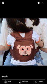 Đai ngồi xe máy cho bé an toàn