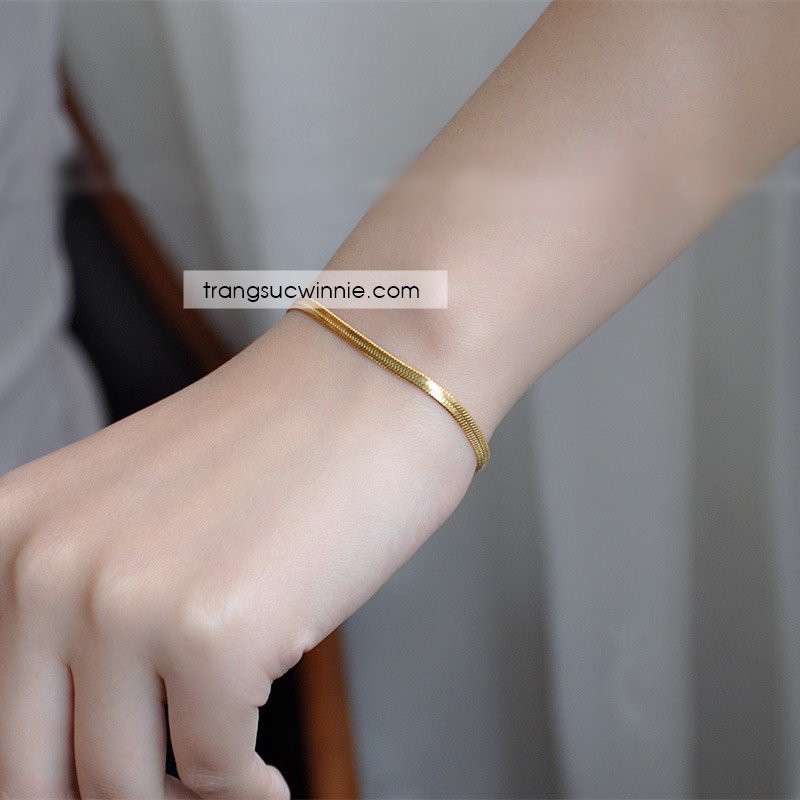 Lắc tay nữ titan ck vàng gold