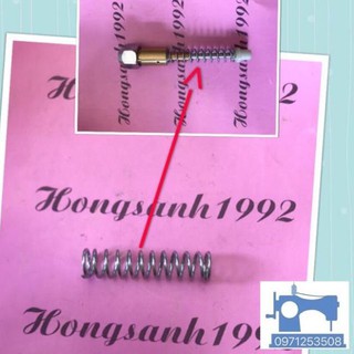 Lò xo lớn trong nòng súng bắn tẩy