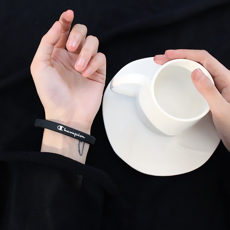 Vòng tay silicone mặt chữ Champion thời trang cho nam và nữ
