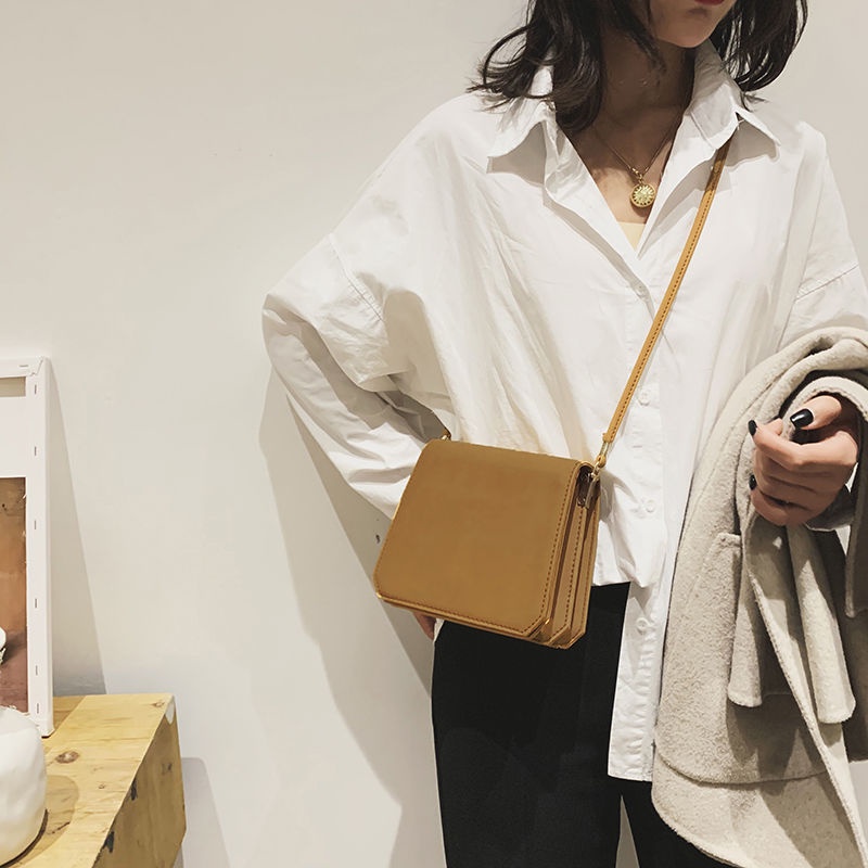 Túi đeo chéo nữ nữ da lỳ phong cách hiện đại Pháp thời trang xuân hè 2023