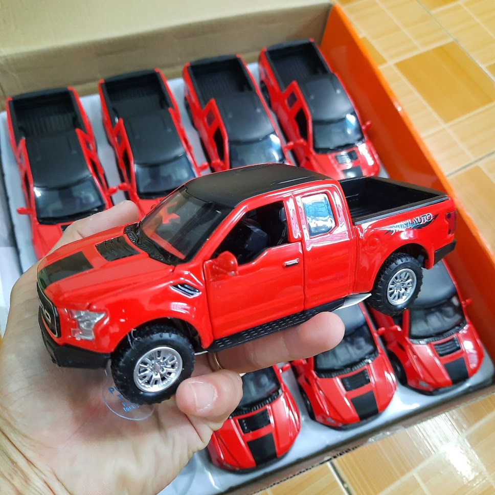 Xe mô hình Ford F150 Raptor tỉ lệ 1:32 xe bằng sắt có âm thanh và đèn xe chạy cót mở các cửa