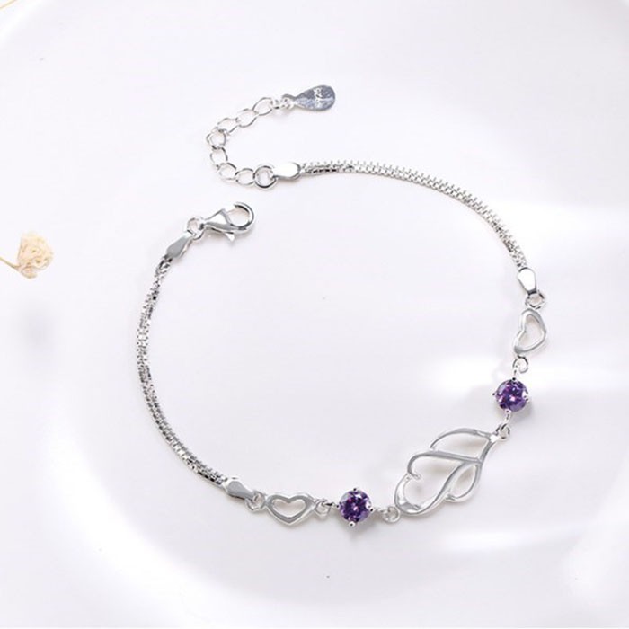 Vòng tay hình hai trái tim lồng nhau mạ bạc đính đá tím cao cấp, sang trọng cho bạn nữ