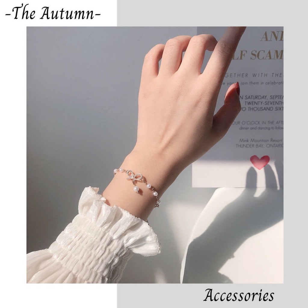 Vòng tay mạ vàng đính ngọc trai nhân tạo hình nơ phong cách hot trend Hàn Quốc cho nữ - The Autumn Accessories