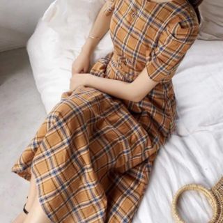 Đầm caro nâu cột nơ eo