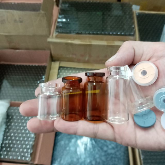 Combo 100 chai thủy tinh như hình 5ml, 10ml màu nâu và trắng trong, đóng nắp bằng kềm, có đầu bóp nhọn, giá 400.000 đồng