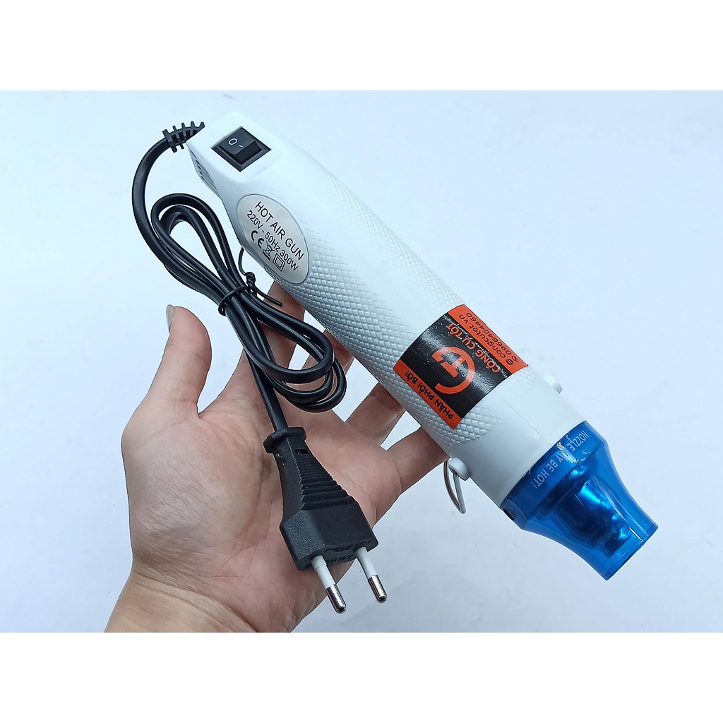 Máy khò nhiệt mini - thổi khí nóng 200°C 300W 220V để khò màng co, tem cao su, bột hàn...