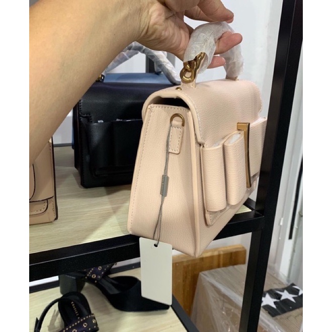 Túi cnk nơ hồng Nude