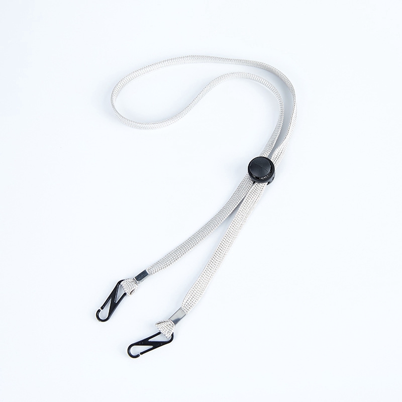 Adjustable strap to attach a ponytail / handy phone hook