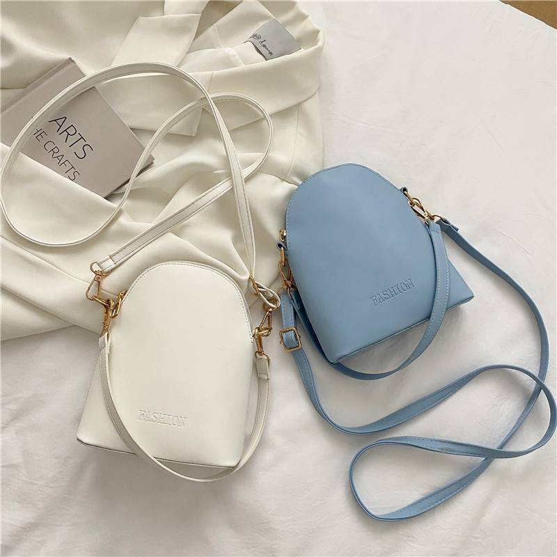 2021 ladies Messenger water bucket new fashion quality solid color seashell bag shoulder hundreds of mini bag