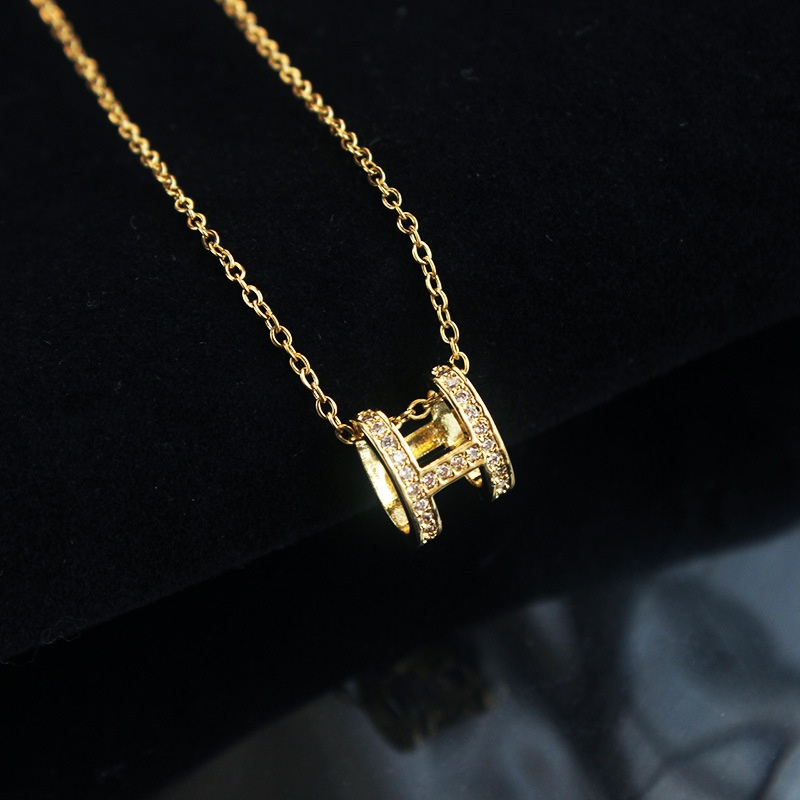 [Không đen gỉ] Dây chuyền thép titan mạ vàng mặt chữ H đính đá TB530