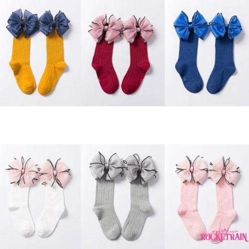 Tất đầu gối đính nơ đáng yêu cho bé gái