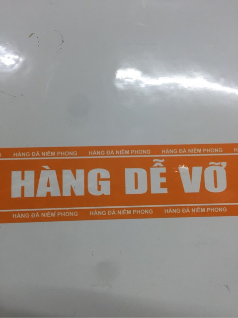 Băng dính niêm phong hàng hoá,băng keo in chữ “Hàng Dễ Vỡ” (màu cam Shopee)