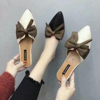 Sục nơ đen trắng